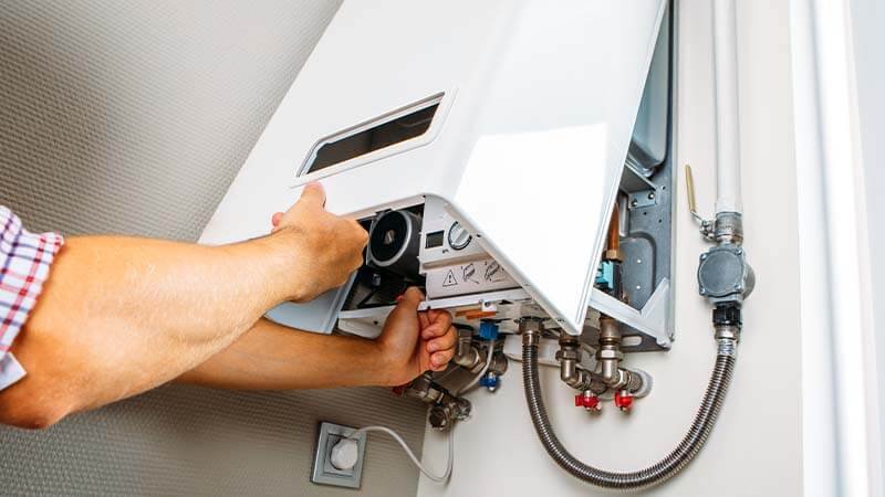 Emergency plumber repairing a plumbing issue in Edgewood