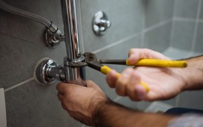 Electrician troubleshooting a home electrical issue in Albuquerque