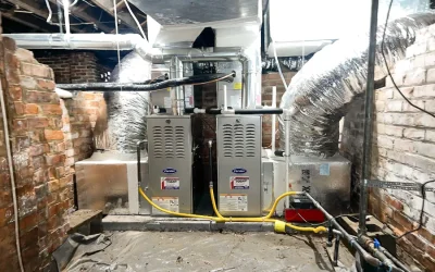 Plumber replacing a bathroom fixture in an Albuquerque home